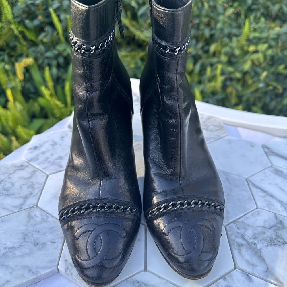 Sleek Black Ankle Boots with Chain Detail